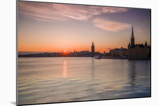 Sweden, Stockholm, Stockholm City Hall and Riddarholmen church, sunset-Walter Bibikow-Mounted Photographic Print