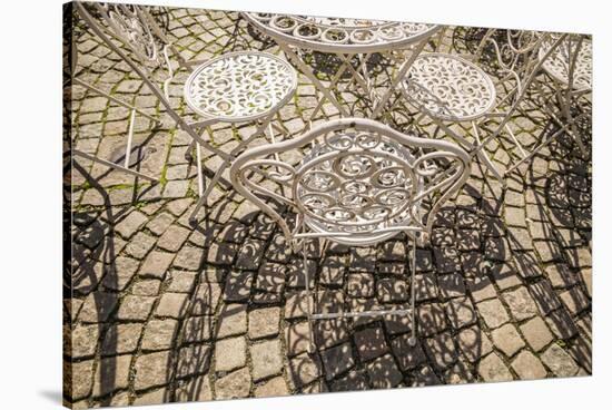 Sweden, Vastragotland and Bohuslan, Gothenburg, outdoor table and chairs-Walter Bibikow-Stretched Canvas