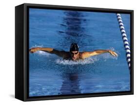 Swimmer Competing in a Butterfly Race-null-Framed Stretched Canvas