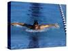 Swimmer Competing in a Butterfly Race-null-Stretched Canvas