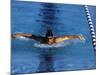 Swimmer Competing in a Butterfly Race-null-Mounted Photographic Print