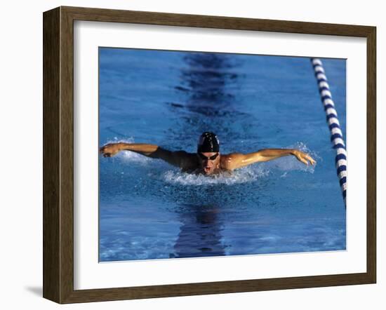 Swimmer Competing in a Butterfly Race-null-Framed Photographic Print