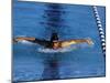 Swimmer Competing in a Butterfly Race-null-Mounted Photographic Print