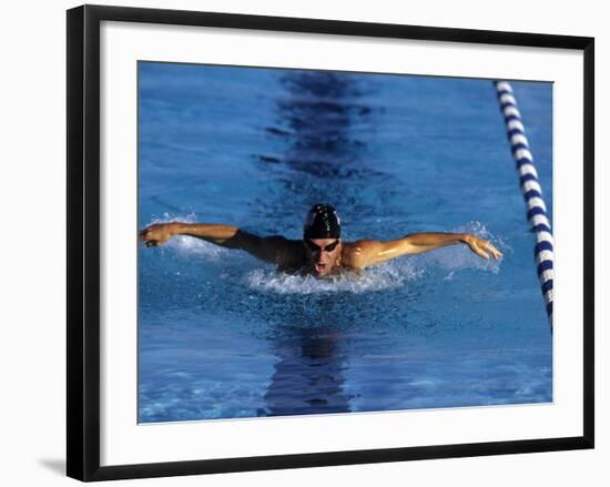 Swimmer Competing in a Butterfly Race-null-Framed Photographic Print