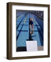 Swimmer Diving Off the Starting Blocks to Begin a Race-Steven Sutton-Framed Photographic Print