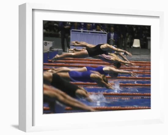 Swimmers Diving to Start a Race at Summer Olympics-null-Framed Photographic Print