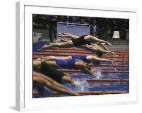 Swimmers Diving to Start a Race at Summer Olympics-null-Framed Photographic Print