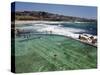 Swimmers Do Laps at Ocean Filled Pools Flanking the Sea at Sydney's Bronte Beach, Australia-Andrew Watson-Stretched Canvas