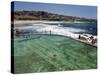 Swimmers Do Laps at Ocean Filled Pools Flanking the Sea at Sydney's Bronte Beach, Australia-Andrew Watson-Stretched Canvas