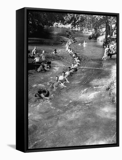 Swimmers Playing on Floating Inner Tubes by Floating Downstream on Cool, Lazy River-null-Framed Stretched Canvas