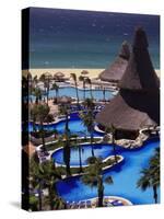 Swimming Pool and Palapas, Cabo San Lucas, Mexico-Walter Bibikow-Stretched Canvas