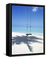 Swing on the Beach Above Palm Tree Shadow-null-Framed Stretched Canvas