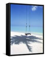 Swing on the Beach Above Palm Tree Shadow-null-Framed Stretched Canvas