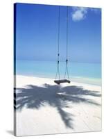 Swing on the Beach Above Palm Tree Shadow-null-Stretched Canvas