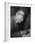 Swiss Architect Le Corbusier Leaning Down to Write with His Glasses Pushed Back on His Forehead-null-Framed Premium Photographic Print