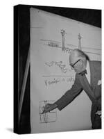 Swiss Architect Le Corbusier Standing on Stage with Notes in His Hand and Drawing on Sketch Pad-null-Stretched Canvas