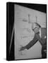 Swiss Architect Le Corbusier Standing on Stage with Notes in His Hand and Drawing on Sketch Pad-null-Framed Stretched Canvas