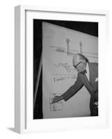 Swiss Architect Le Corbusier Standing on Stage with Notes in His Hand and Drawing on Sketch Pad-null-Framed Photographic Print