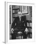 Swiss Psychiatrist Dr. Carl Jung Holding Pipe as He Sits on Chair in His Library at Home-Dmitri Kessel-Framed Premium Photographic Print