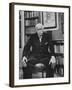 Swiss Psychiatrist Dr. Carl Jung Holding Pipe as He Sits on Chair in His Library at Home-Dmitri Kessel-Framed Premium Photographic Print