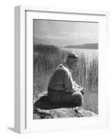 Swiss Psychiatrist Dr. Carl Jung Sitting on Stone Wall Overlooking Lake Zurich-Dmitri Kessel-Framed Premium Photographic Print