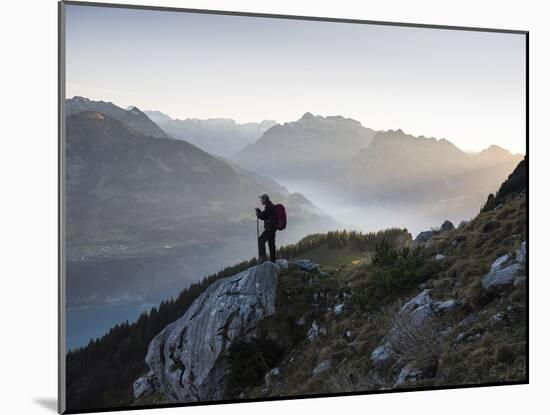 Switzerland, Canton St. Gallen, Amden, Mountaineer, Backpack, Valley View-Dietmar Walser-Mounted Photographic Print