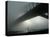 Sydney Harbor Bridge is Covered by a Thick Vail of Fog in the Early Hours of the Morning-null-Stretched Canvas