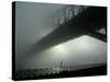 Sydney Harbor Bridge is Covered by a Thick Vail of Fog in the Early Hours of the Morning-null-Stretched Canvas