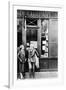 Sylvia Beach and Ernest Hemingway in Front of Shakespeare and Company Bookshop, C.1928-null-Framed Photographic Print