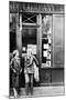 Sylvia Beach and Ernest Hemingway in Front of Shakespeare and Company Bookshop, C.1928-null-Mounted Photographic Print