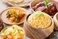 Indian Vegetarian Food. Biryani Rice, Curry Dhal and Milk Tea on Dining Table.-szefei-Photographic Print