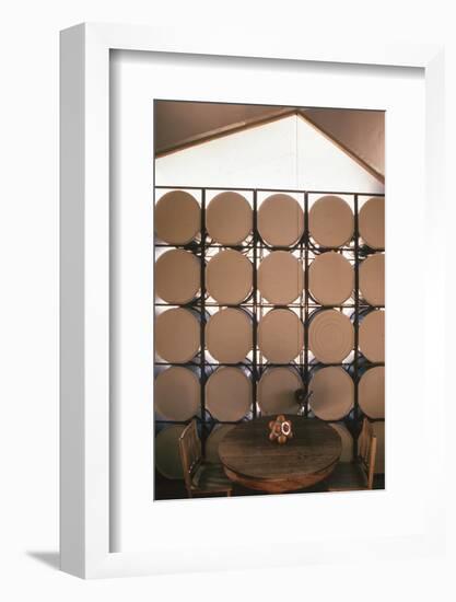 Table Againts a Stack of Barrels in a Geodesic Dome Home, Called 'Zome,' Corrales, NM, 1972-John Dominis-Framed Photographic Print