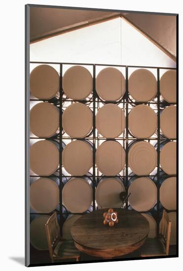 Table Againts a Stack of Barrels in a Geodesic Dome Home, Called 'Zome,' Corrales, NM, 1972-John Dominis-Mounted Photographic Print