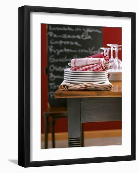 Table Linen: Fabric Napkins on a Pile of Plates-Jan-peter Westermann-Framed Photographic Print