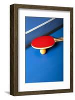 Table Tennis or Ping Pong Rackets and Balls on a Blue Table-Andreyuu-Framed Photographic Print