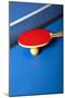 Table Tennis or Ping Pong Rackets and Balls on a Blue Table-Andreyuu-Mounted Photographic Print