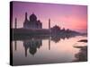 Taj Mahal From Along the Yamuna River at Dusk, India-Walter Bibikow-Stretched Canvas