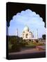 Taj Mahal Through Ornate Arch-Charles Bowman-Stretched Canvas