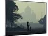 Taj Mahal with Woman and Child Silhouetted in Foreground at Dusk, Agra, Uttar Pradesh, India-David Beatty-Mounted Photographic Print