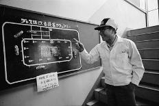 Soichiro Honda Showing Engineers Solution to Body Noise Problem at Research Facility, Japan, 1967-Takeyoshi Tanuma-Framed Photographic Print