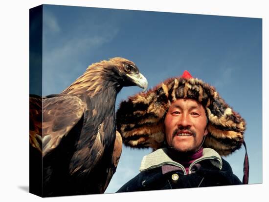 Takhuu Head Eagle Man, Altai Sum, Golden Eagle Festival, Mongolia-Amos Nachoum-Stretched Canvas