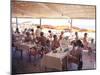 Taking Lunch in a Shaded Restaurant by the Shore in Juan Les Pins on the French Riviera, France-Ralph Crane-Mounted Photographic Print