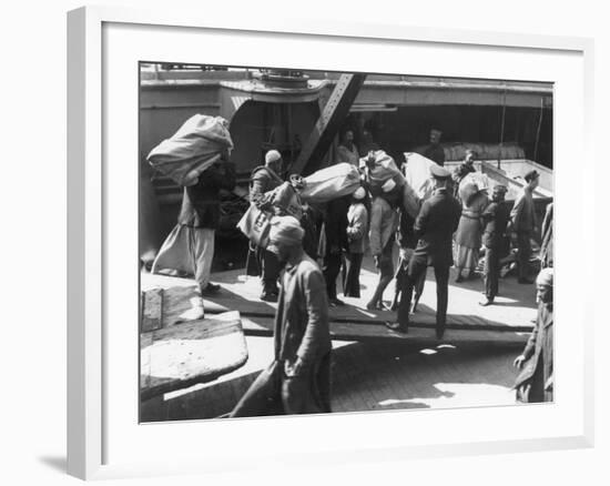 Taking on the Mail Port Said Egypt-Pontin Brown-Framed Photographic Print