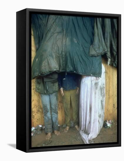 Taking Shelter from the Storm at Woodstock-Bill Eppridge-Framed Stretched Canvas