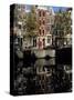 Tall Traditional Style Houses Reflected in the Water of a Canal, Amsterdam, the Netherlands-Richard Nebesky-Stretched Canvas