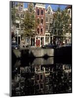 Tall Traditional Style Houses Reflected in the Water of a Canal, Amsterdam, the Netherlands-Richard Nebesky-Mounted Photographic Print