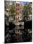 Tall Traditional Style Houses Reflected in the Water of a Canal, Amsterdam, the Netherlands-Richard Nebesky-Mounted Photographic Print