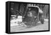 Tank Truck with Snow Plow Cleans the Streets-null-Framed Stretched Canvas