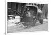 Tank Truck with Snow Plow Cleans the Streets-null-Framed Art Print