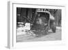 Tank Truck with Snow Plow Cleans the Streets-null-Framed Art Print